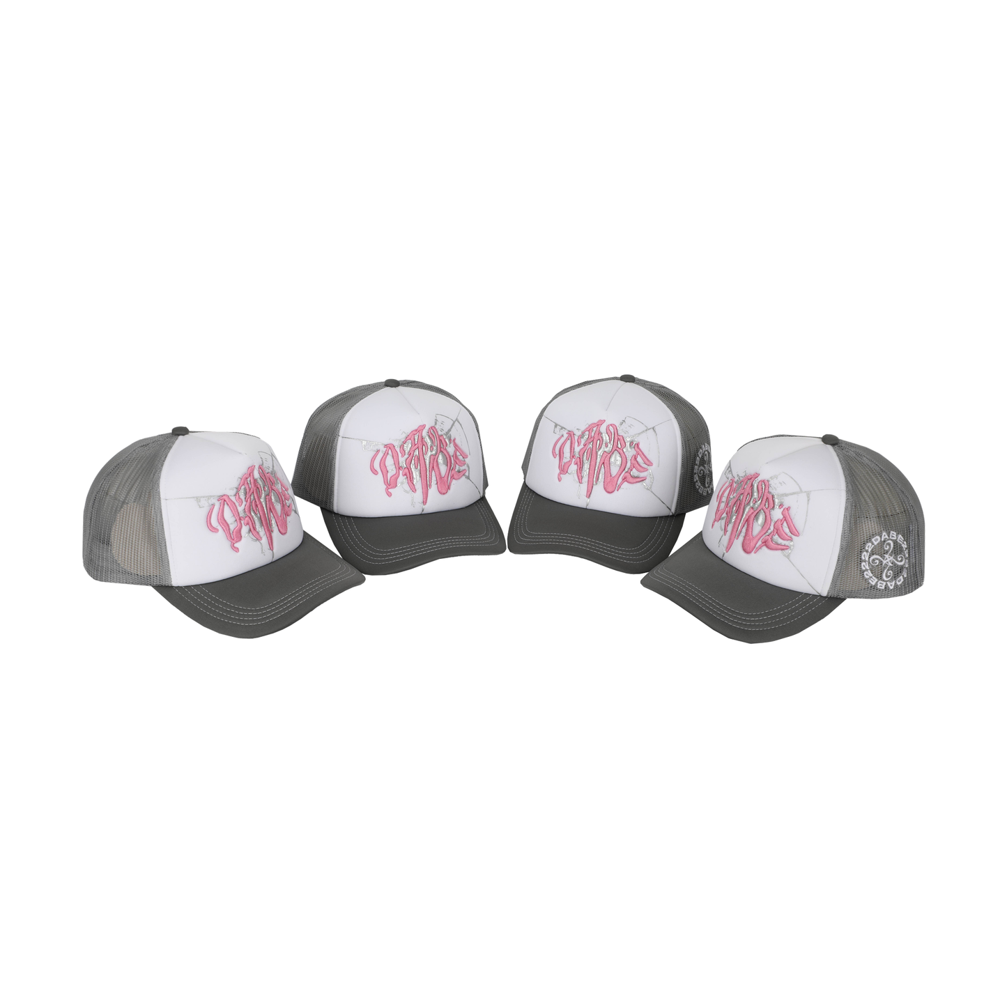 The Cap Broken Glass Grey/Pink by 22DABE22. A black six-panel cap with a lilac broken glass design embroidered on the front and 22DABE22 logo on the side. Adjustable strap at the back for a customized fit, pre-curved visor to shield from sun and rain, and breathable eyelets on top to keep the head cool and dry. Perfect accessory to elevate your streetwear game.