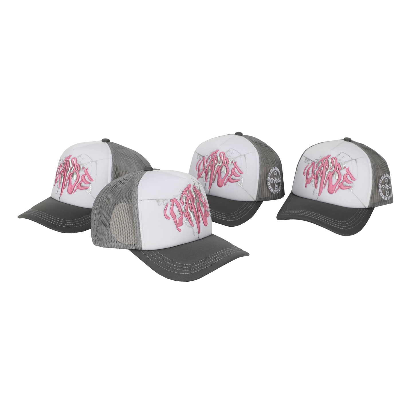 The Cap Broken Glass Grey/Pink by 22DABE22. A black six-panel cap with a lilac broken glass design embroidered on the front and 22DABE22 logo on the side. Adjustable strap at the back for a customized fit, pre-curved visor to shield from sun and rain, and breathable eyelets on top to keep the head cool and dry. Perfect accessory to elevate your streetwear game.