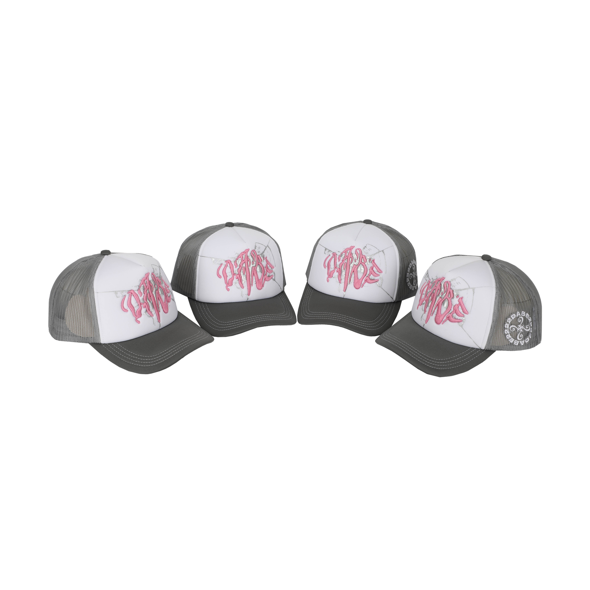 The Cap Broken Glass Grey/Pink by 22DABE22. A black six-panel cap with a lilac broken glass design embroidered on the front and 22DABE22 logo on the side. Adjustable strap at the back for a customized fit, pre-curved visor to shield from sun and rain, and breathable eyelets on top to keep the head cool and dry. Perfect accessory to elevate your streetwear game.