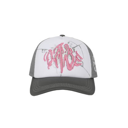 The Cap Broken Glass Grey/Pink by 22DABE22. A black six-panel cap with a lilac broken glass design embroidered on the front and 22DABE22 logo on the side. Adjustable strap at the back for a customized fit, pre-curved visor to shield from sun and rain, and breathable eyelets on top to keep the head cool and dry. Perfect accessory to elevate your streetwear game.