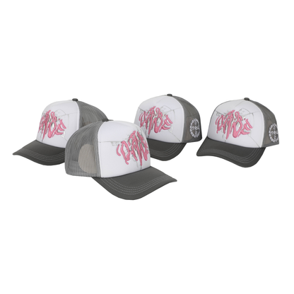 The Cap Broken Glass Grey/Pink by 22DABE22. A black six-panel cap with a lilac broken glass design embroidered on the front and 22DABE22 logo on the side. Adjustable strap at the back for a customized fit, pre-curved visor to shield from sun and rain, and breathable eyelets on top to keep the head cool and dry. Perfect accessory to elevate your streetwear game.